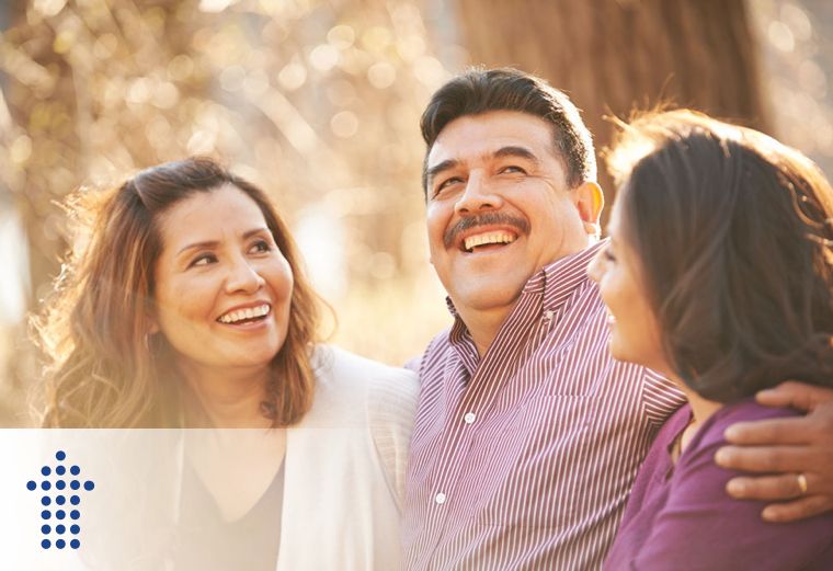 A group of people outside laughing